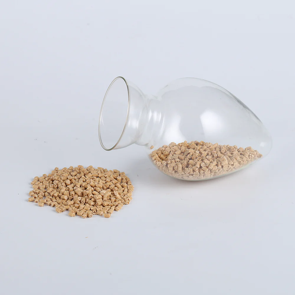 Red pine fiber PP masterbatch pellets in a laboratory flask